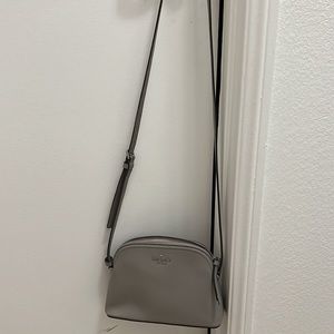 LIGHT GREY KATE SPADE CROSSBODY!!!! Lightly worn but good condition :)